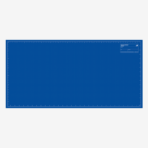 Blue side of the mat with dot grid and rulers